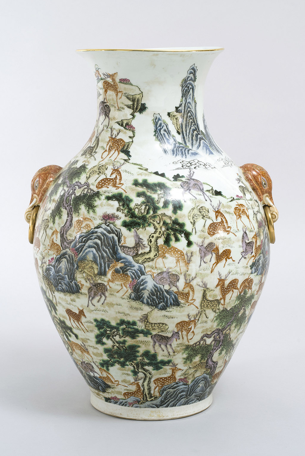 Appraisal: PORCELAIN PALACE VASE In Hundred Deer pattern With elephant's-head and