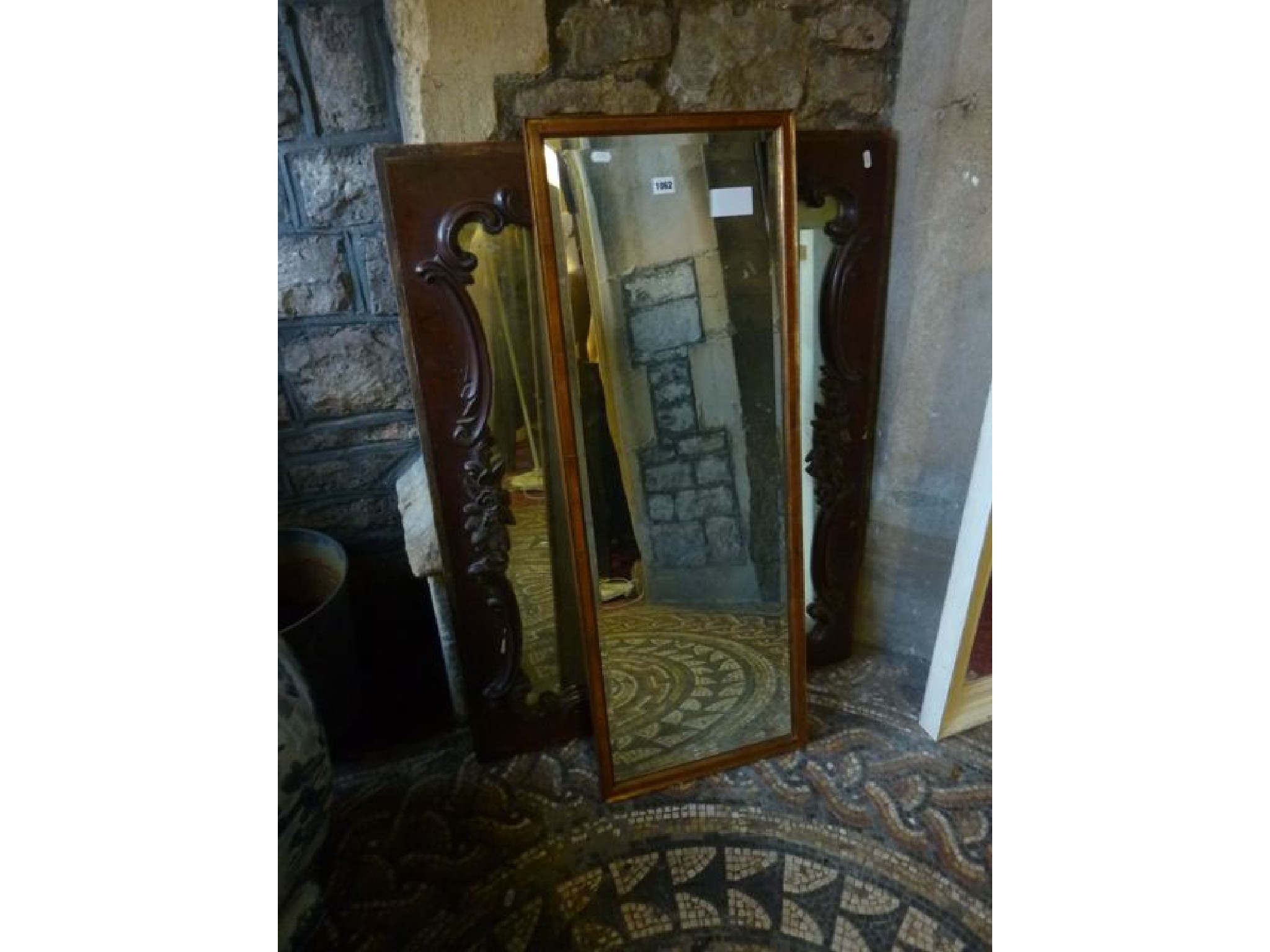 Appraisal: A dressing mirror wall mounted set within a yew wood