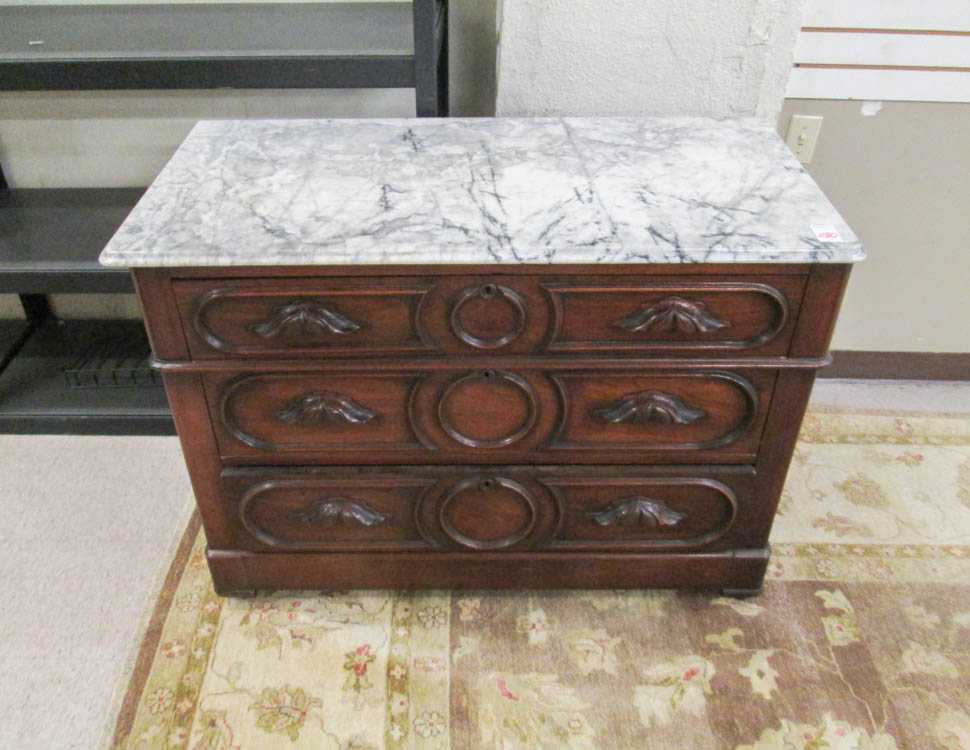 Appraisal: A VICTORIAN MARBLE-TOP WALNUT CHEST American c having a rectangular