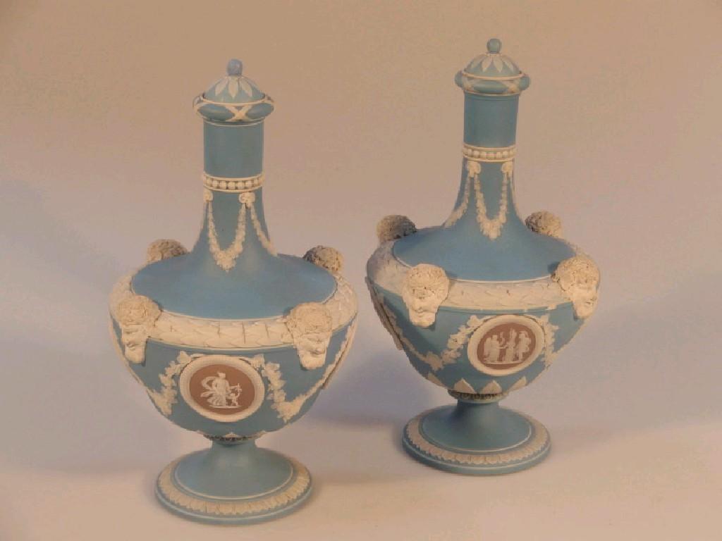 Appraisal: A pair of Wedgwood blue jasper classical urn shaped bottle