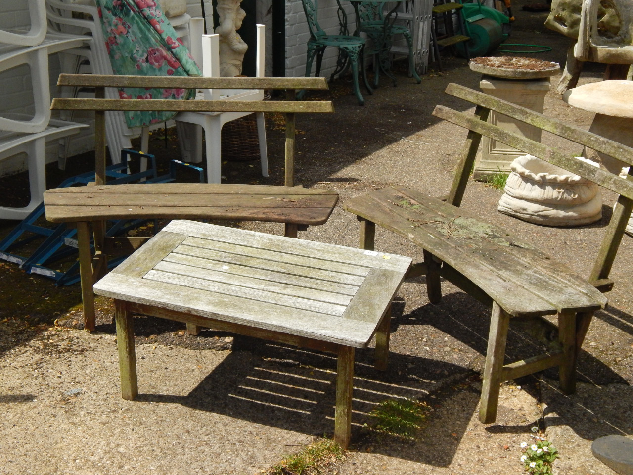 Appraisal: A pair of garden seats and an occasional table