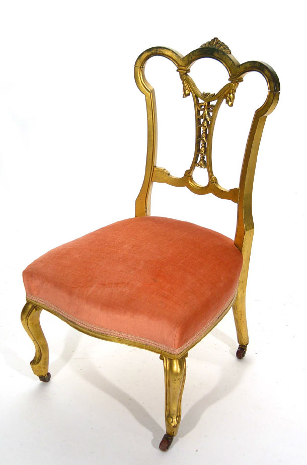 Appraisal: Gilded Edwardian bedroom chair with swag and bow mouldings to