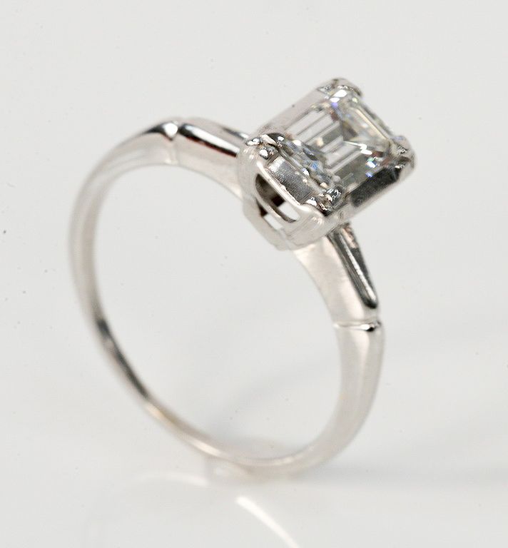 Appraisal: karat white gold and diamond ring set with emerald cut