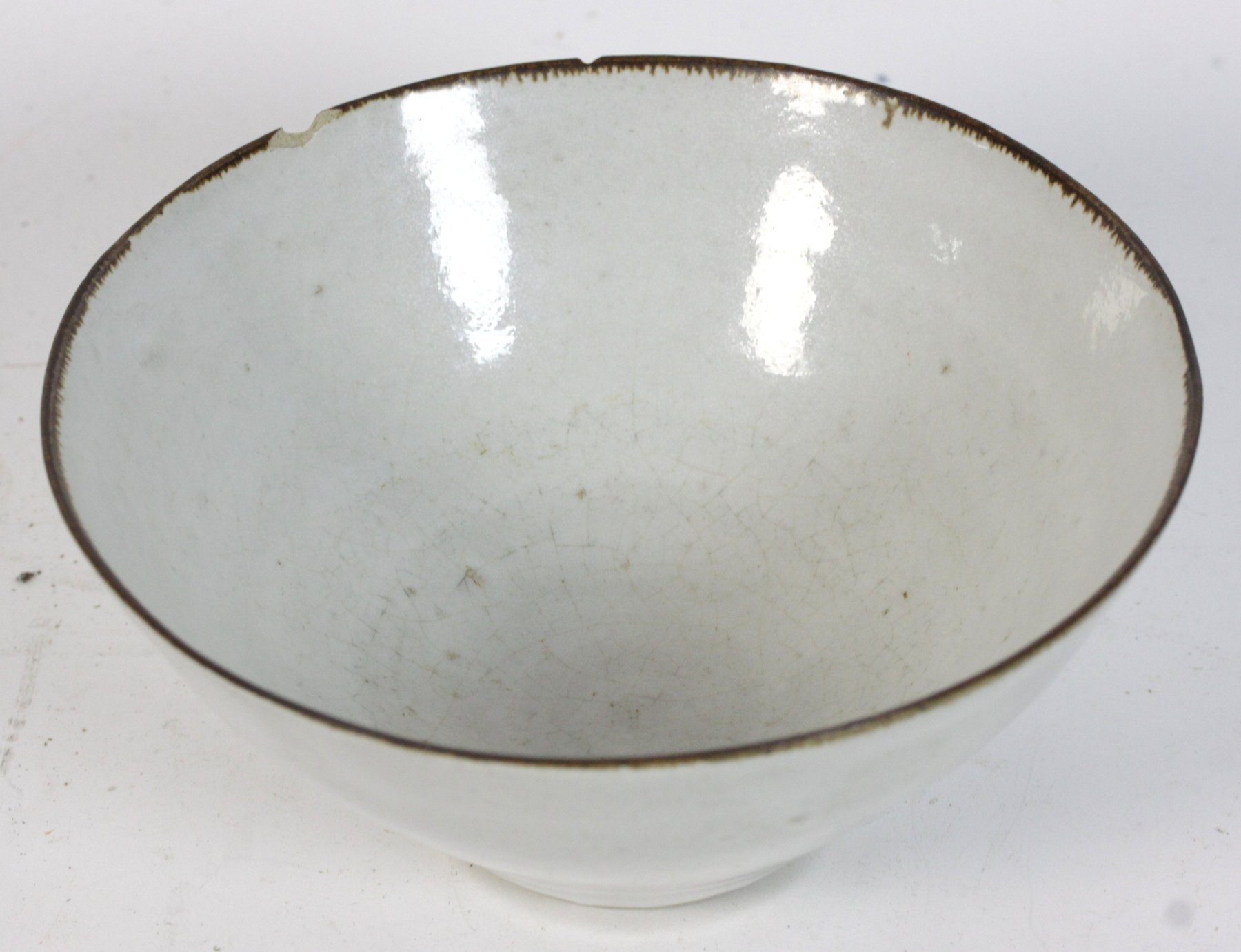 Appraisal: A studio pottery bowl by Lucie Rie circular with pale