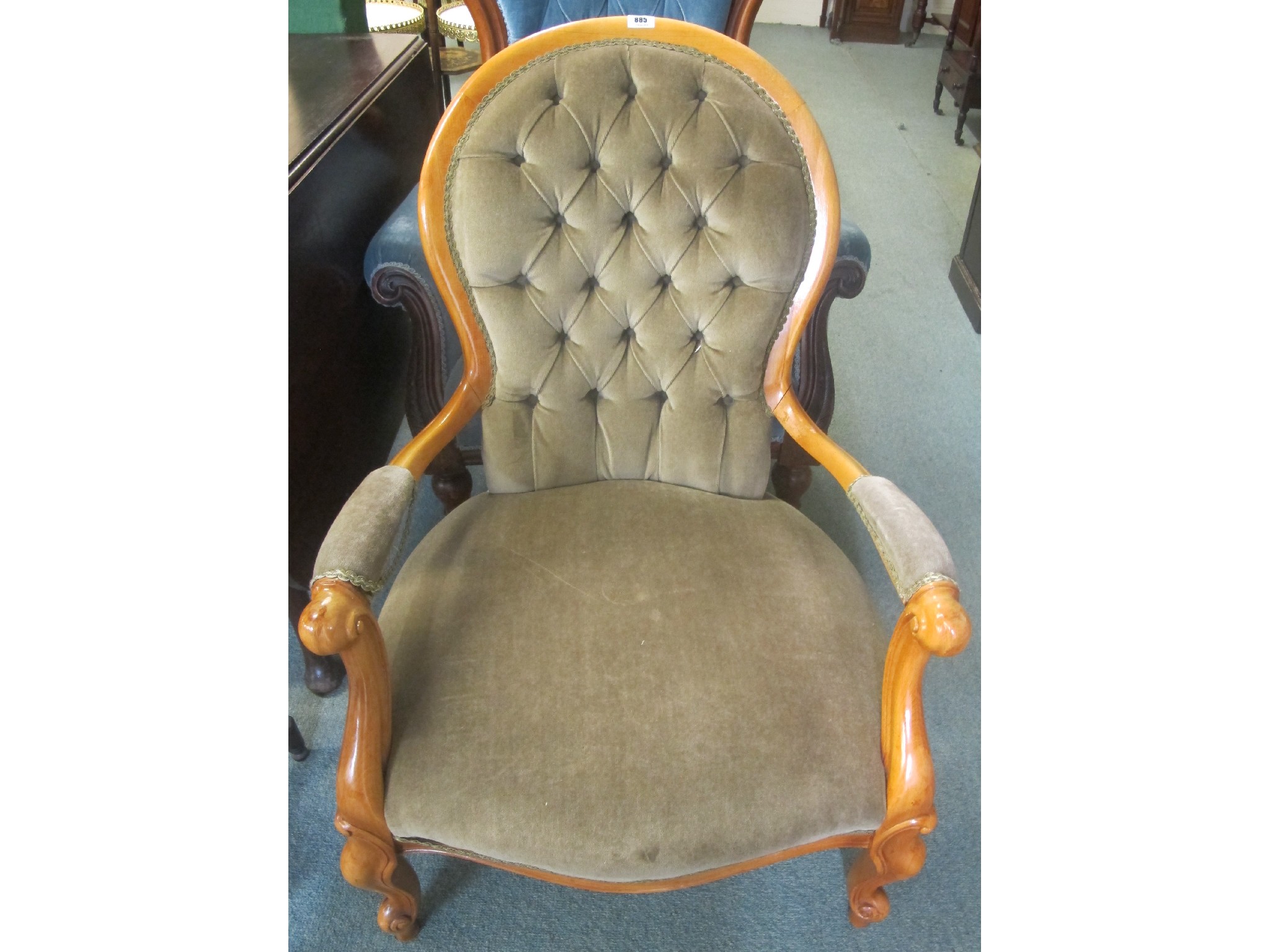 Appraisal: A reproduction buttonback parlour armchair