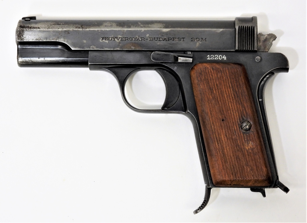 Appraisal: HUNGARIAN FEMARU M PISTOL Hungary caliber serial number walnut grips