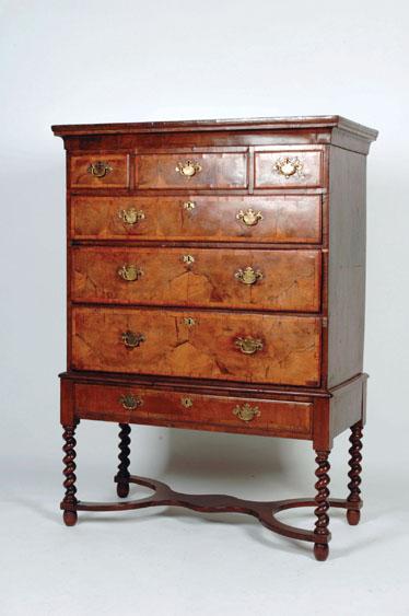 Appraisal: A GEORGE I WALNUT CHEST ON STAND the rectangular crossbanded