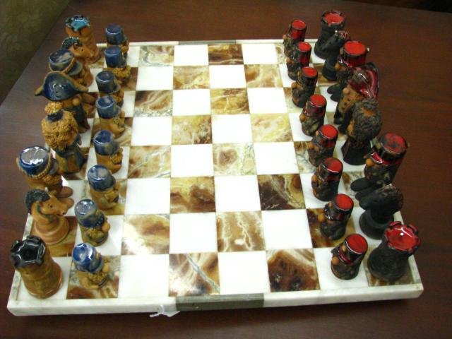 Appraisal: Marble and ceramic chess set marble board is x with