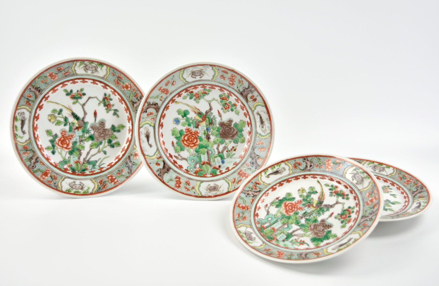 Appraisal: Chinese ROC Period four plates painted with flowering plants issuing