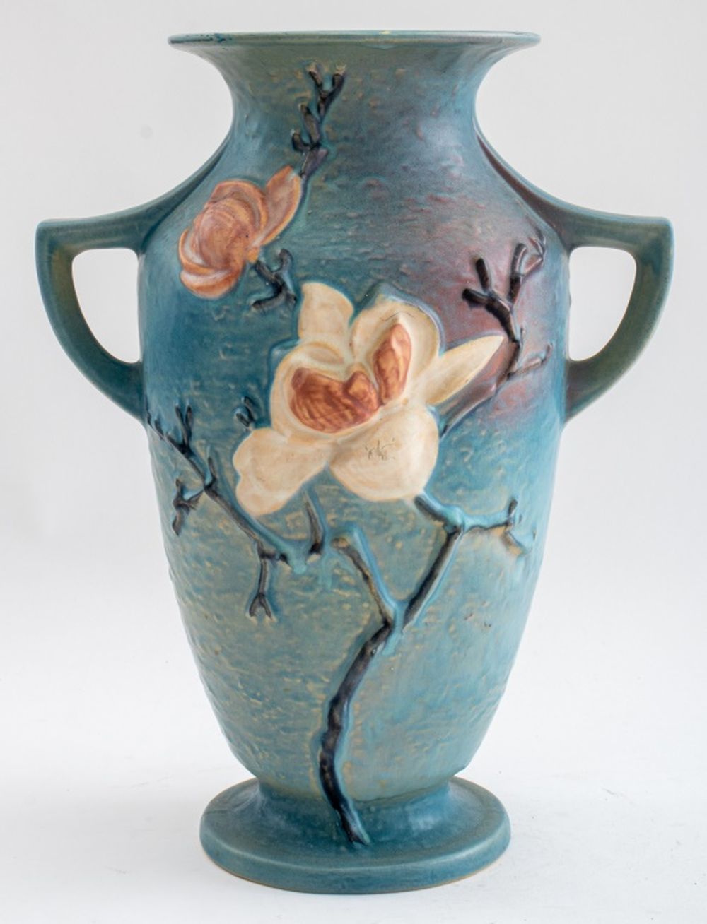 Appraisal: ROSEVILLE BLUE MAGNOLIA CERAMIC HANDLED VASE Vintage Roseville ceramic pottery