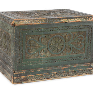 Appraisal: An Indonesian Carved and Painted Wood Trunk th Century Height