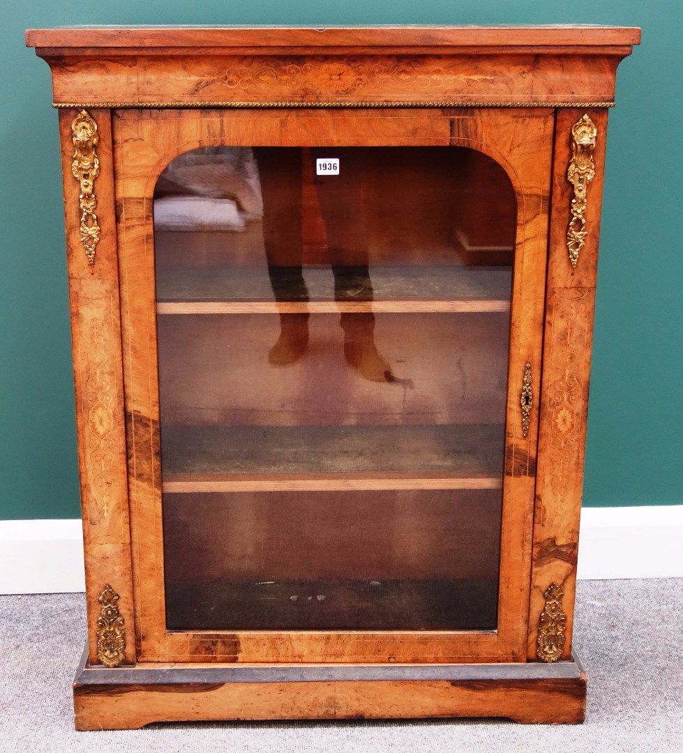 Appraisal: A Victorian gilt metal mounted marquetry inlaid walnut pier cabinet