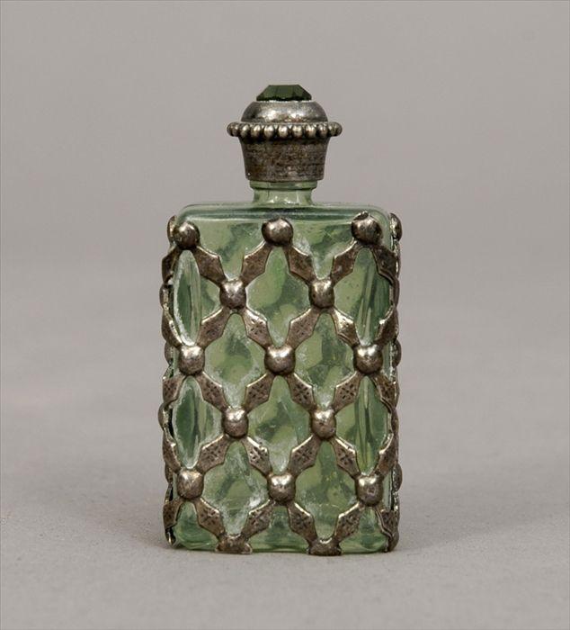 Appraisal: Continental Silvered-Metal Mounted Green Glass Scent Bottle in