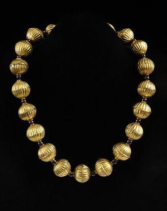 Appraisal: Hollow Ribbed Gold and Spherical bead and Garnet Necklace