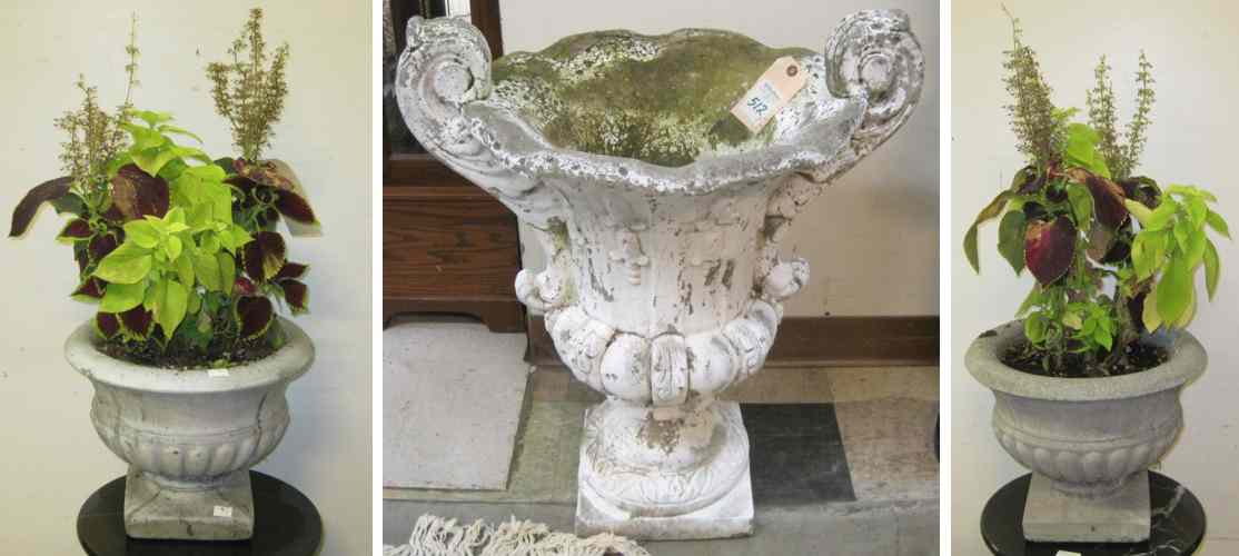 Appraisal: THREE CAST CONCRETE GARDEN ACCESSORIES pair of footed planters and