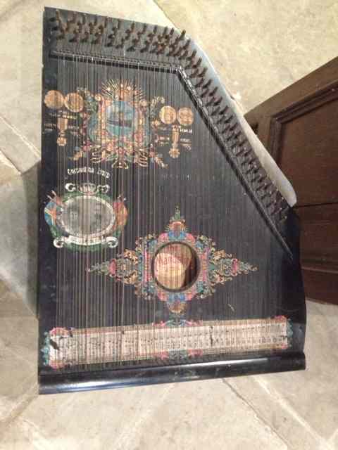 Appraisal: A George V Coronation mandolin harp with transfer decoration Descriptions