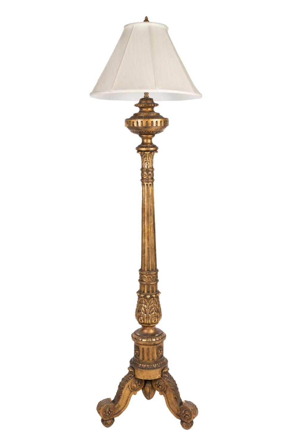 Appraisal: ITALIAN BAROQUE STYLE GILT WOOD TORCHIEREwith shade and two sockets