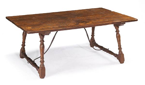 Appraisal: A Spanish Baroque iron mounted walnut writing table The rectangular