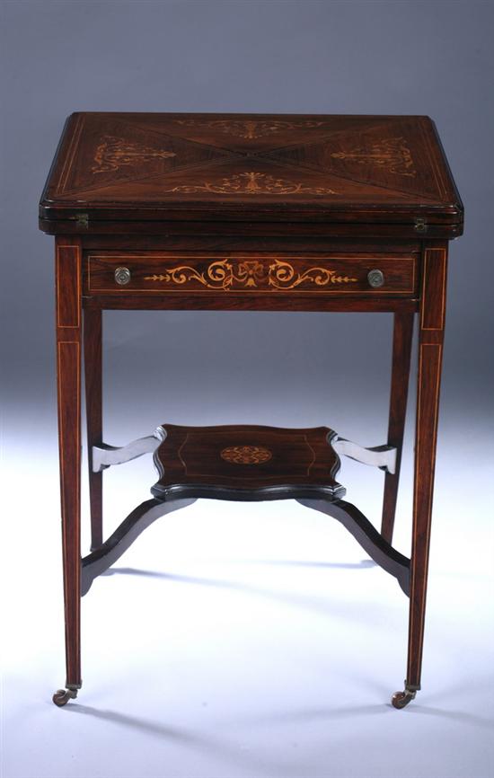 Appraisal: NEOCLASSICAL REVIVAL INLAID ROSEWOOD ENVELOPE GAMES TABLE th century marquetry