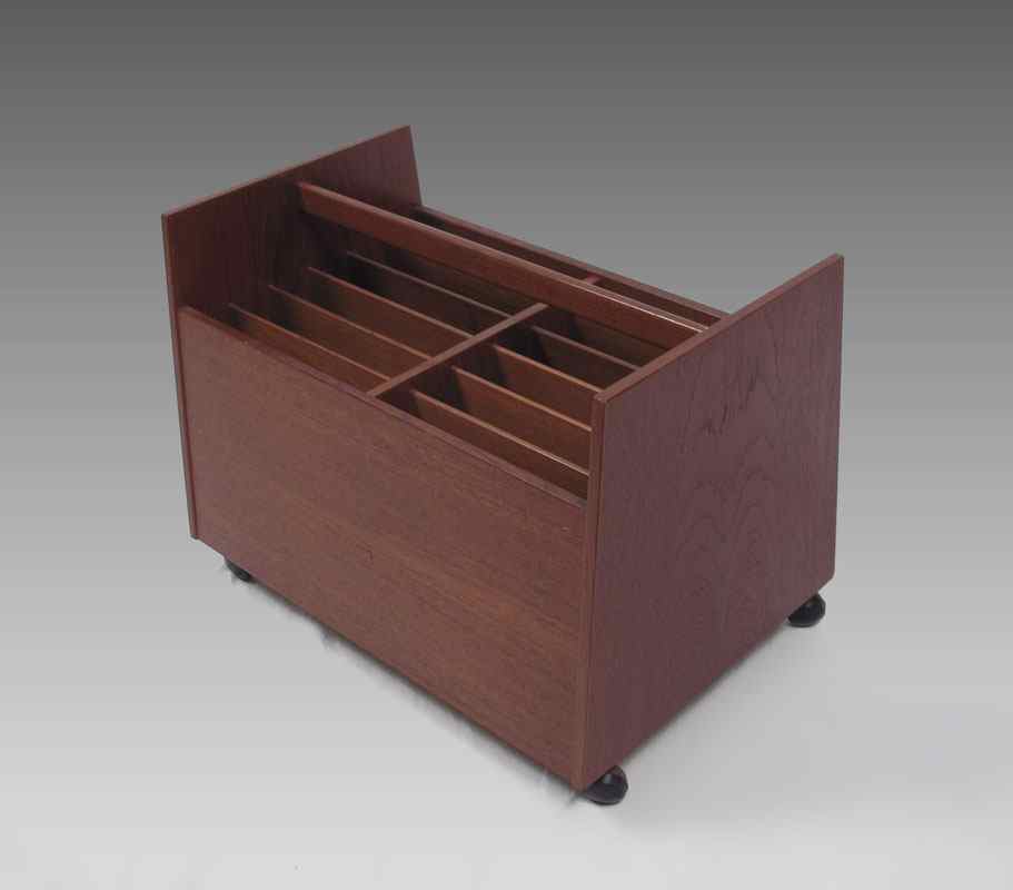 Appraisal: MID CENTURY MODERN TEAK MAGAZINE RACK ON WHEELS Mellem Strands