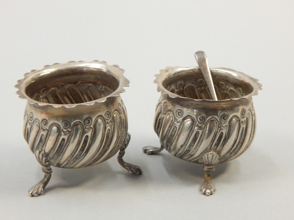 Appraisal: A pair of Victorian silver salts each with fluted decoration