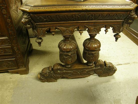 Appraisal: th Century style oak carved table with lion head corners