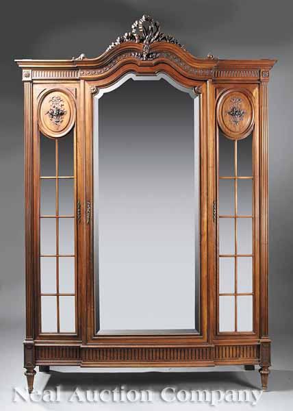 Appraisal: A French Carved Walnut Armoire in the Louis XVI Taste