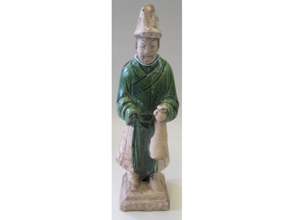 Appraisal: th Century Chinese terracotta figure of a man with green