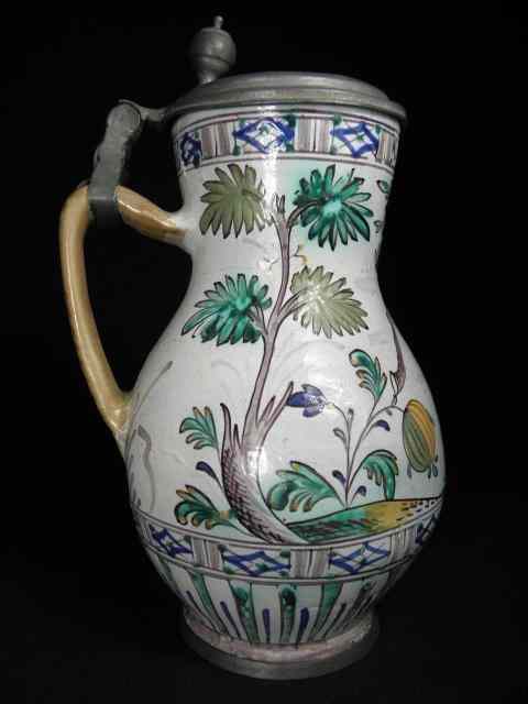 Appraisal: An early continental faience and pewter stein Probably Dutch circa