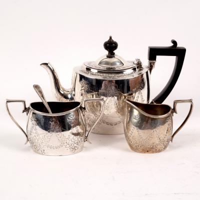 Appraisal: A bachelor's three-piece silver tea set the teapot London the