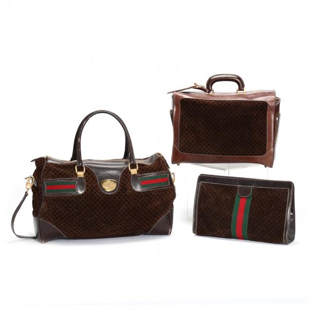 Appraisal: TWO VINTAGE GUCCI TRAVEL BAGS AND A MATCHING CLUTCH Made