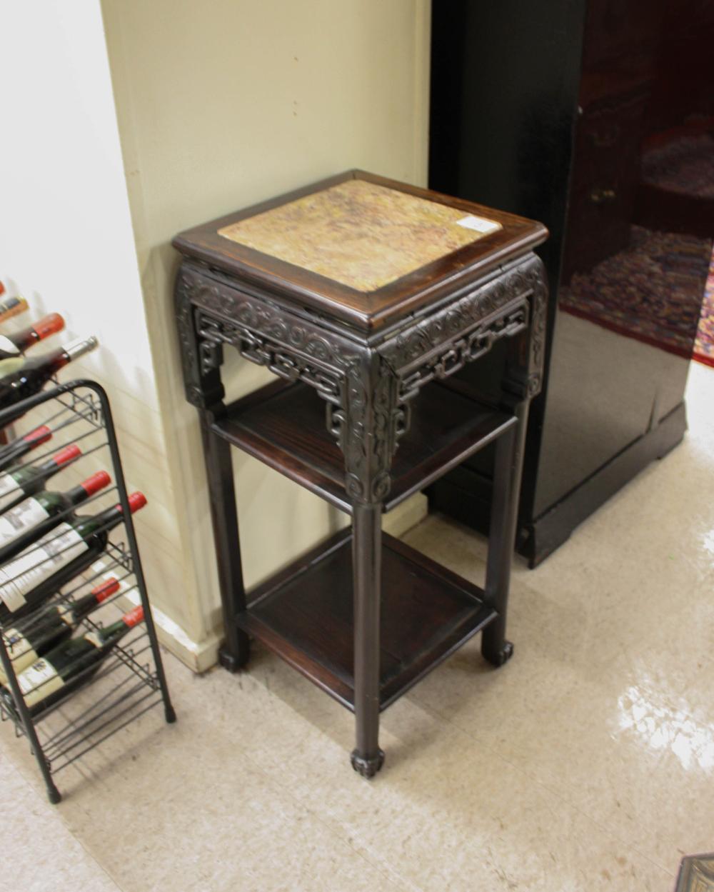 Appraisal: THREE-TIER ROSEWOOD PEDESTAL TABLE Chinese early th century having a