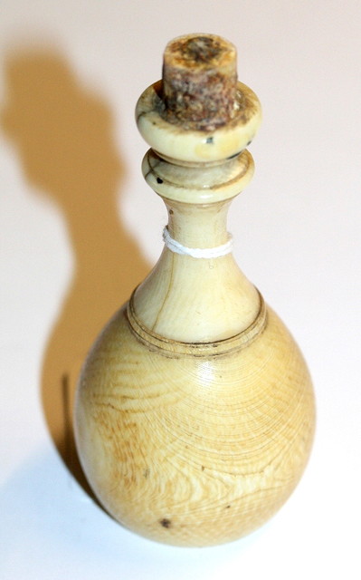 Appraisal: A TURNED IVORY HANDLED SEAL silver coloured metal with hobnail