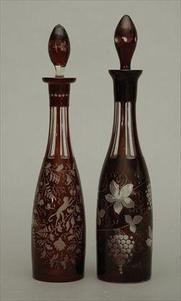 Appraisal: Two Bohemian Ruby Flashed and Etched Glass Decanters to in