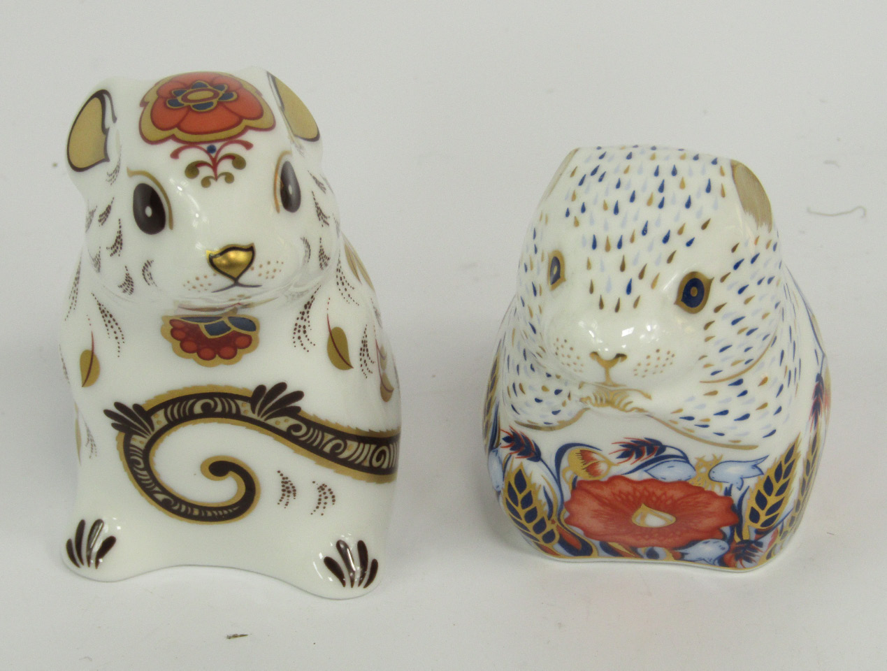 Appraisal: Two Royal Crown Derby Imari porcelain paperweights modelled as the