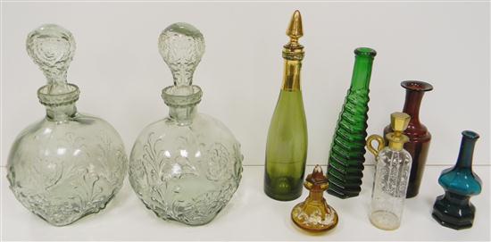 Appraisal: Two green tinted glass round decanters '' high two enameled