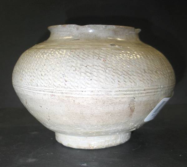 Appraisal: A small punch'ong ware jar Korea th th Century cracked