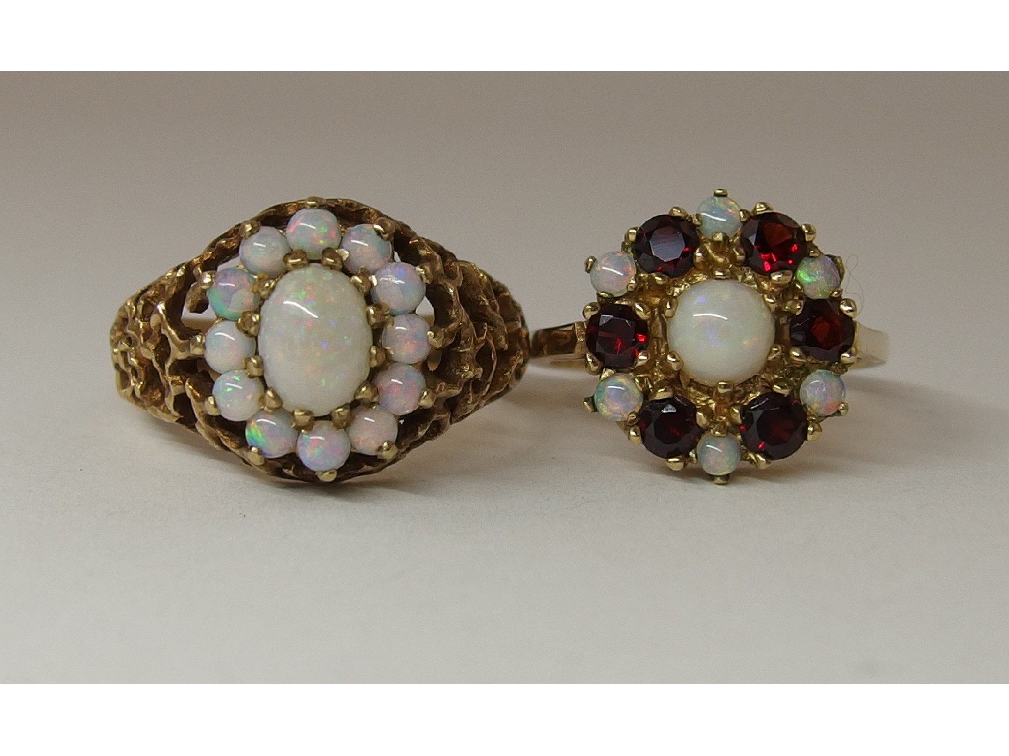 Appraisal: A ct retro opal cluster ring together with a ct