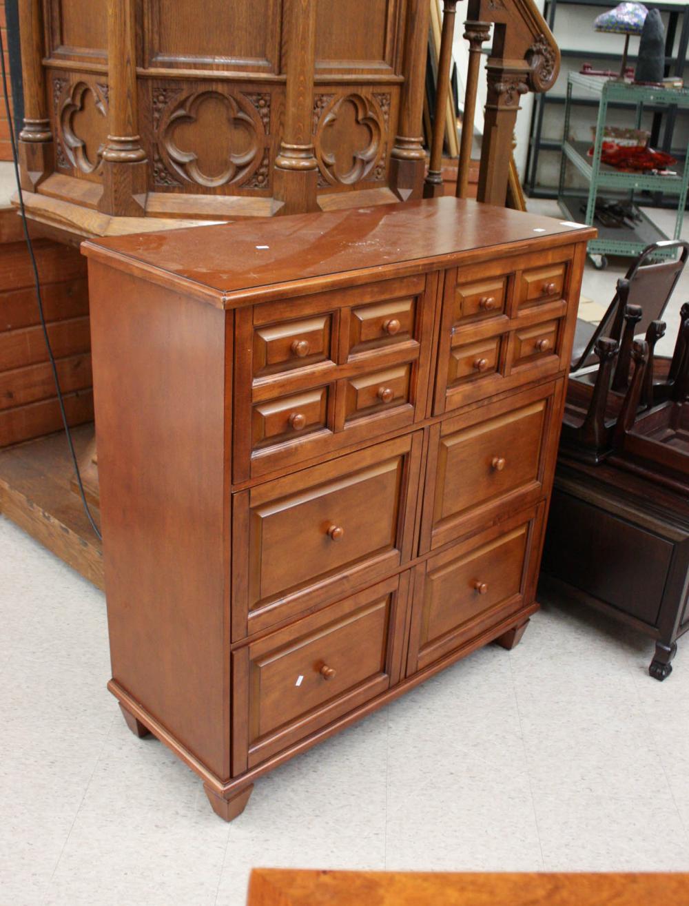 Appraisal: PAIR OF SIX-DRAWER FILE CABINETS wood construction with cherry finish