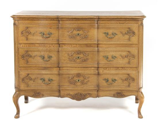 Appraisal: Provincial Style Oak Commode having a serpentine top over conforming