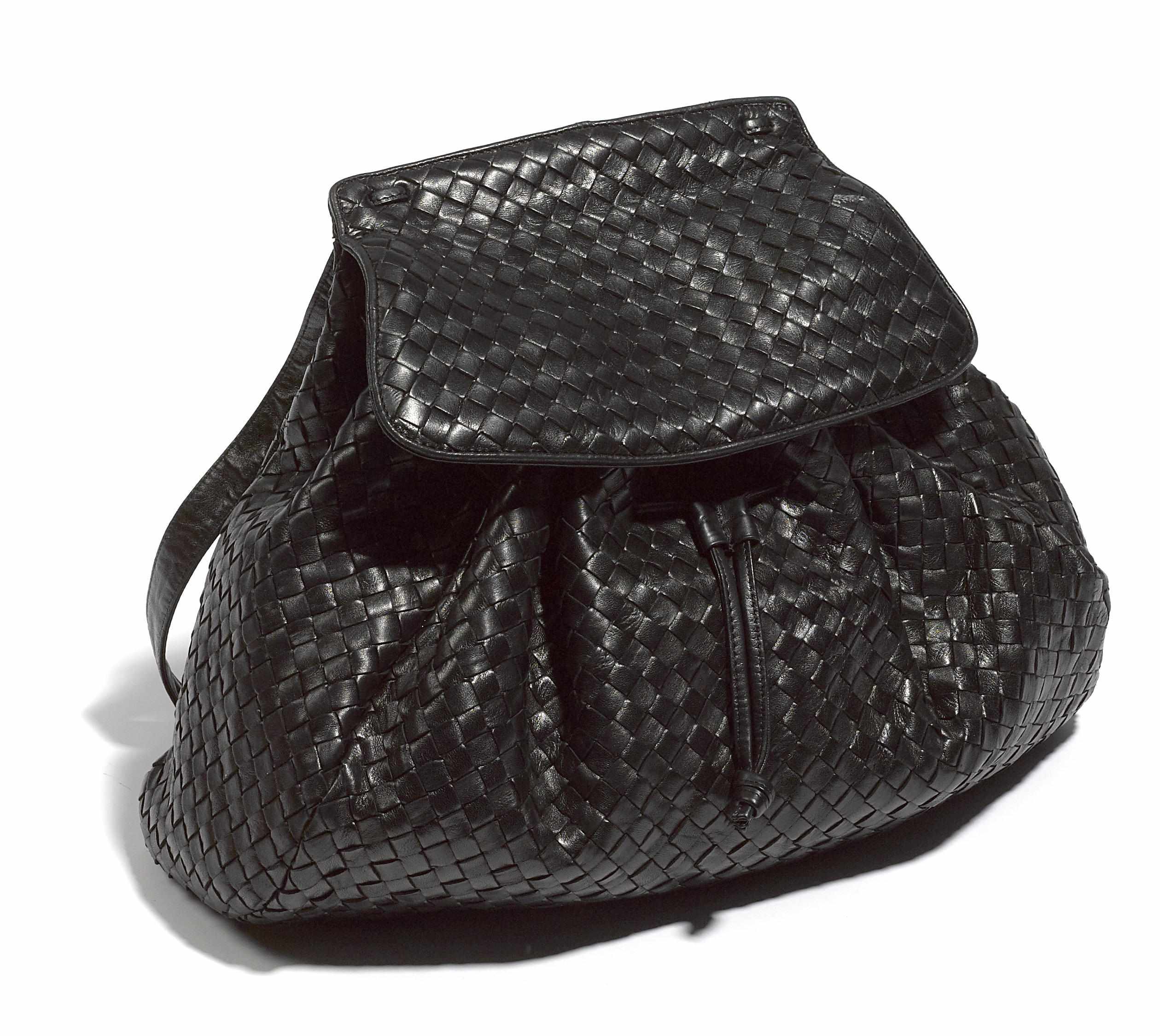 Appraisal: A Bottega Veneta black woven leather handbag size in x