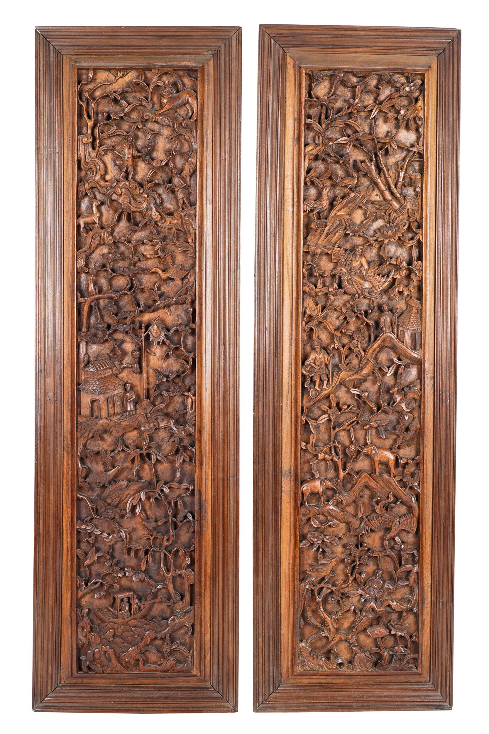 Appraisal: PAIR OF SOUTHEAST ASIAN RELIEF-CARVED WOOD PANELS each depicting figures