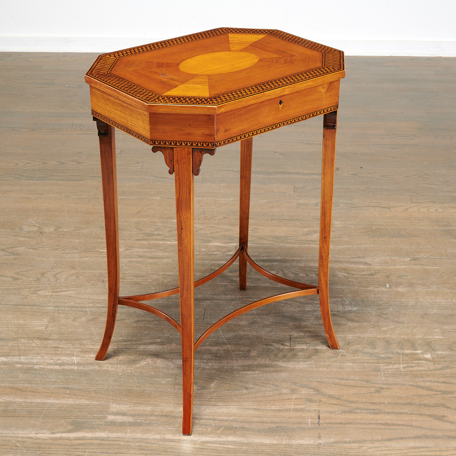 Appraisal: CONTINENTAL EBONY INLAID FRUITWOOD WORK TABLE th c parquetry inlaid