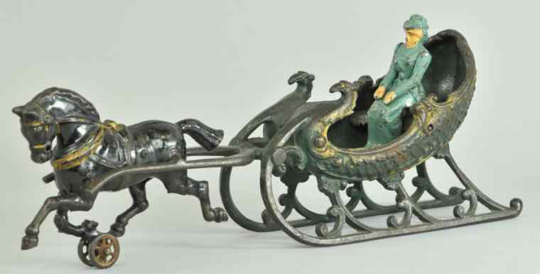 Appraisal: HUBLEY SLEIGH Cast iron green open sleigh drawn by solo