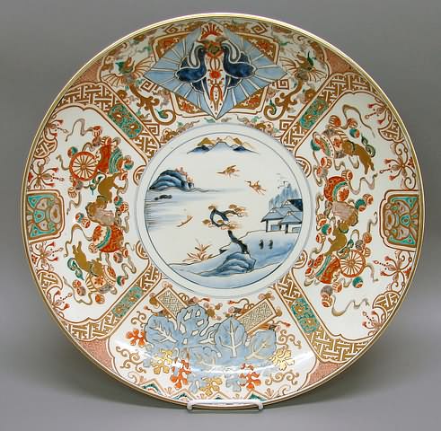 Appraisal: Center rondel with harbor scene outer reserves painted with stylized