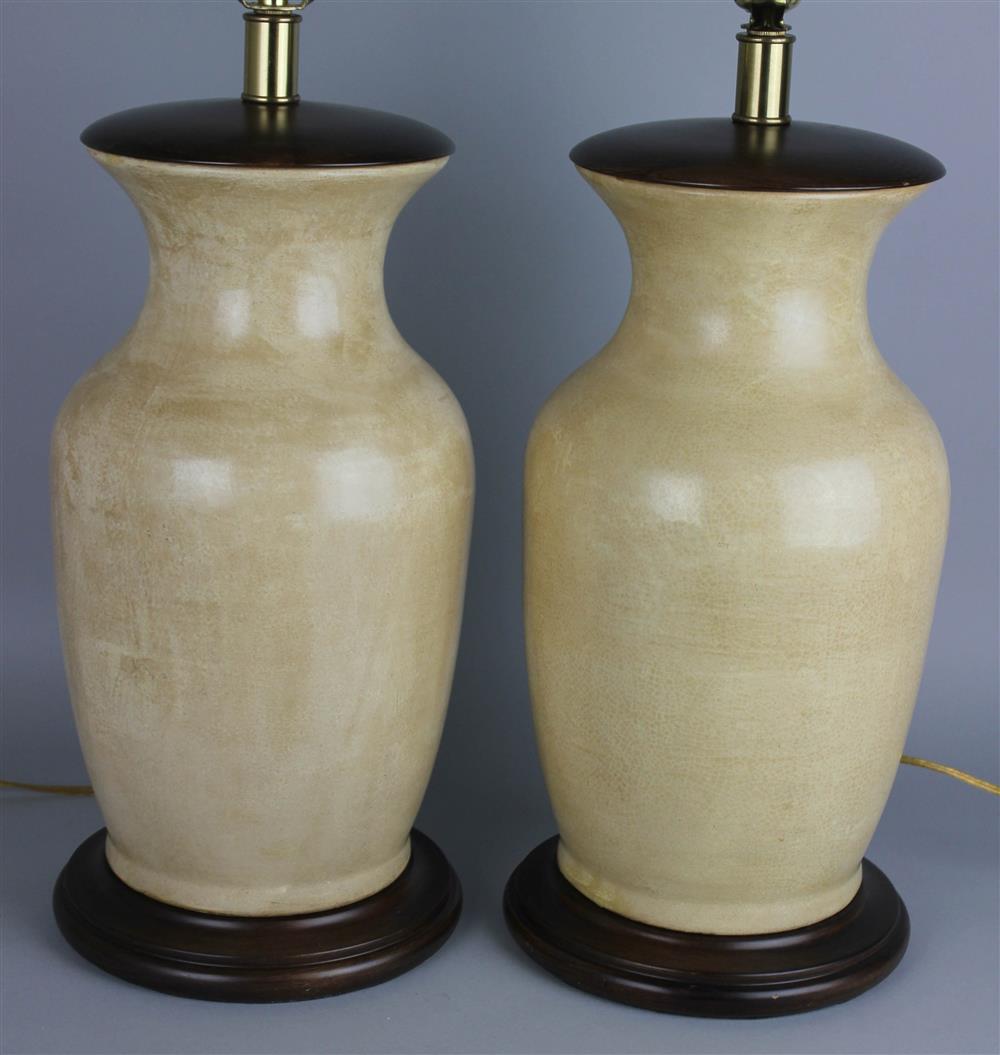 Appraisal: PAIR OF CREAM CRACKLE-GLAZED BALUSTER TABLE LAMPS ESTATE OF TOM