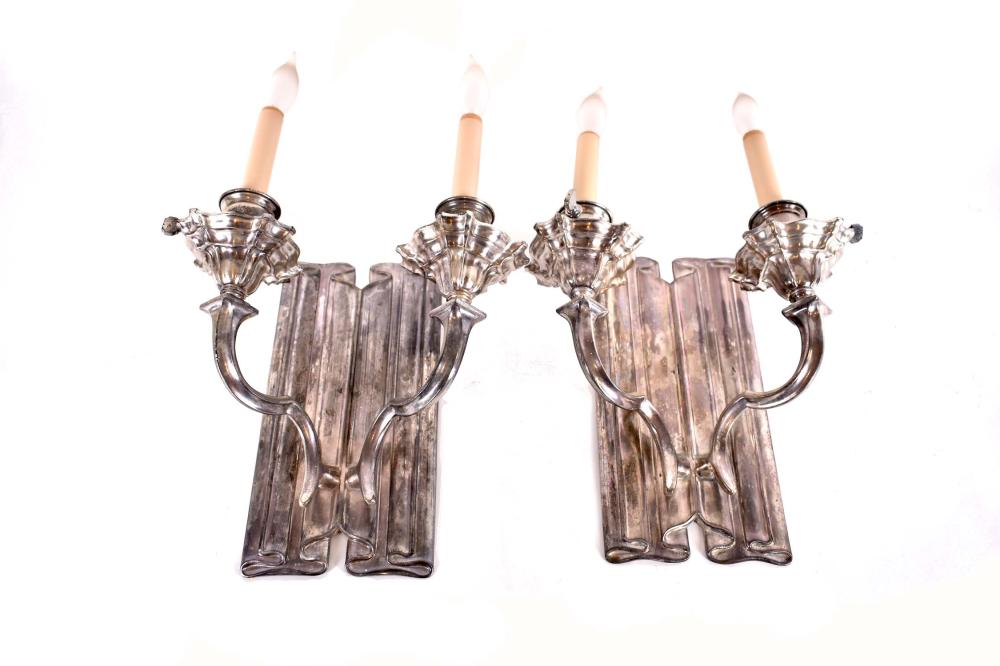 Appraisal: PAIR OF SILVERED METAL TWO-LIGHT SCONCESCirca - Each rectangular linen-fold