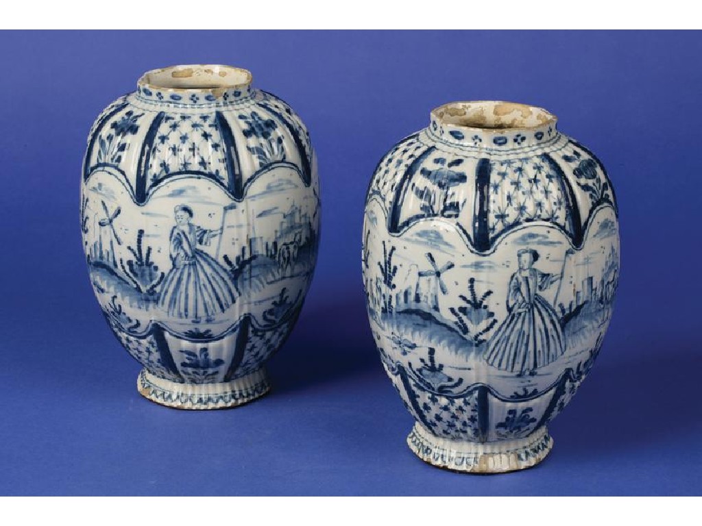 Appraisal: A PAIR OF DELFTWARE BLUE AND WHITE VASES of lobed