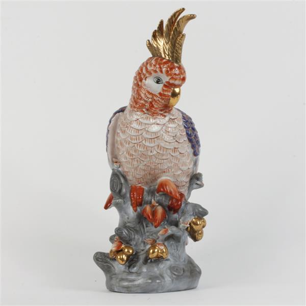 Appraisal: Chinese hand painted and gilt porcelain cockatoo on naturalistic base