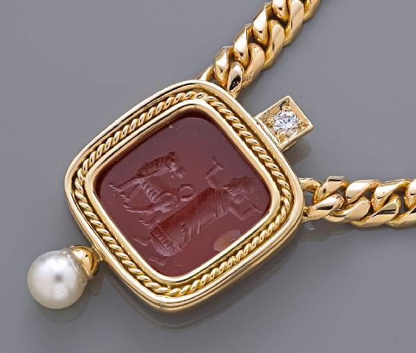 Appraisal: A carnelian diamond and imitation pearl necklace mounted in eighteen